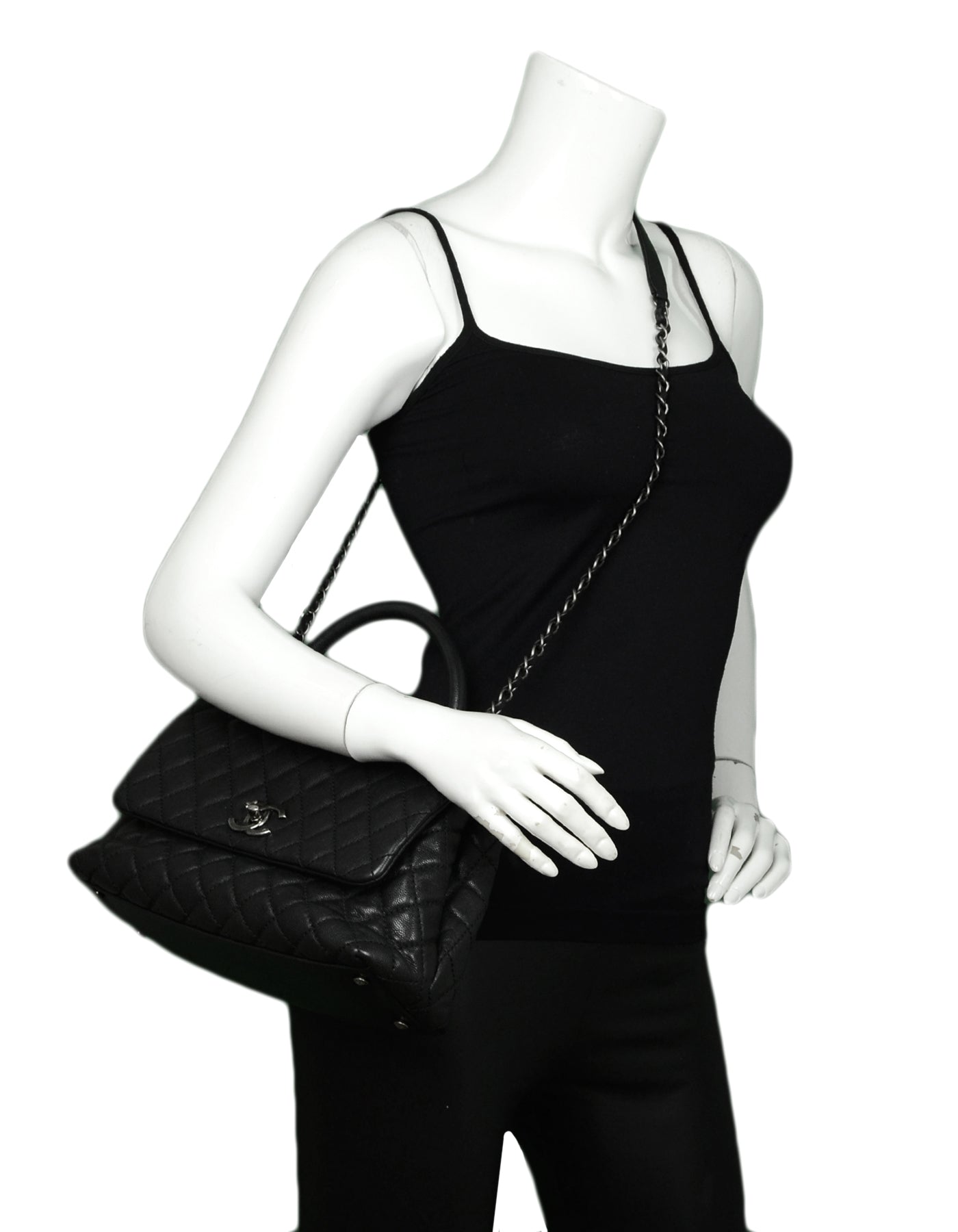 Chanel Petit sac à rabat Coco Handle matelassé en cuir Caviar Noir