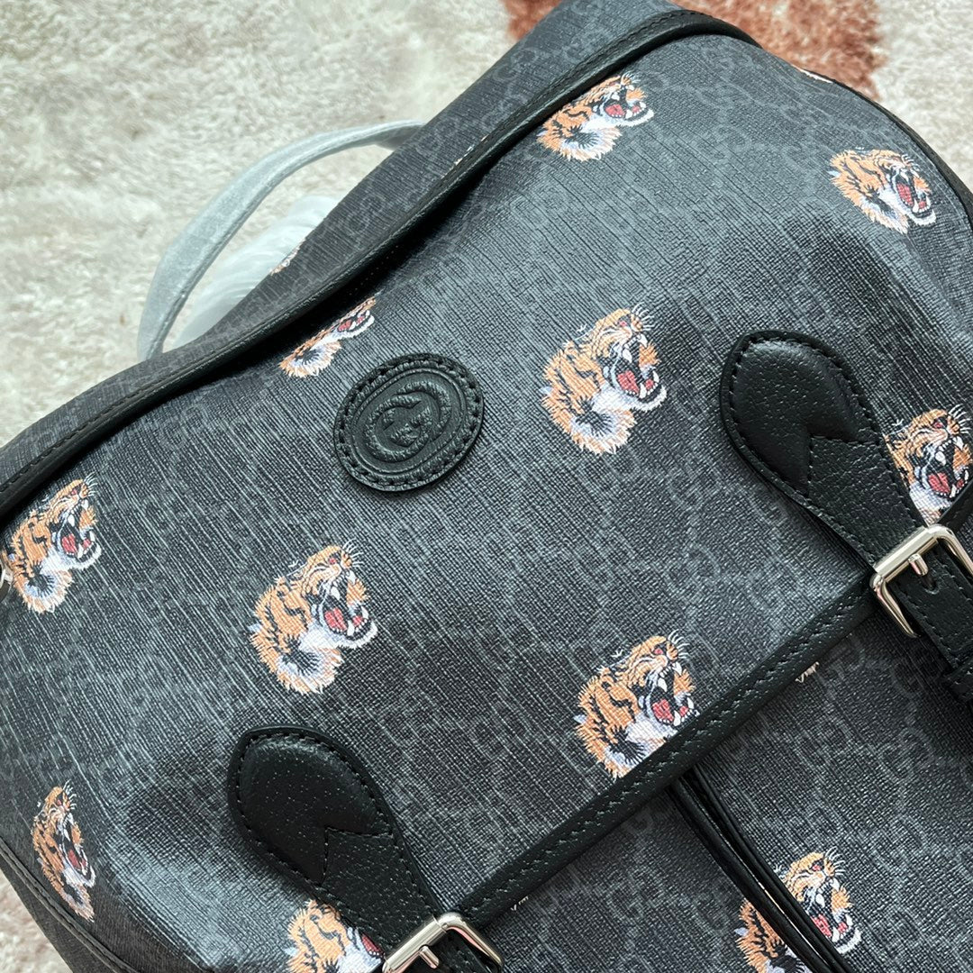 SAC À DOS MOYEN IMPRIMÉ TIGRE 43 EN TOILE NOIRE ET FINITIONS EN CUIR